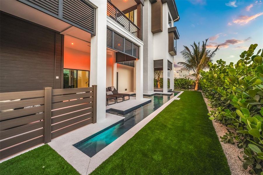 Exterior details and patio area of a home in , Bradenton Beach (Image 3).