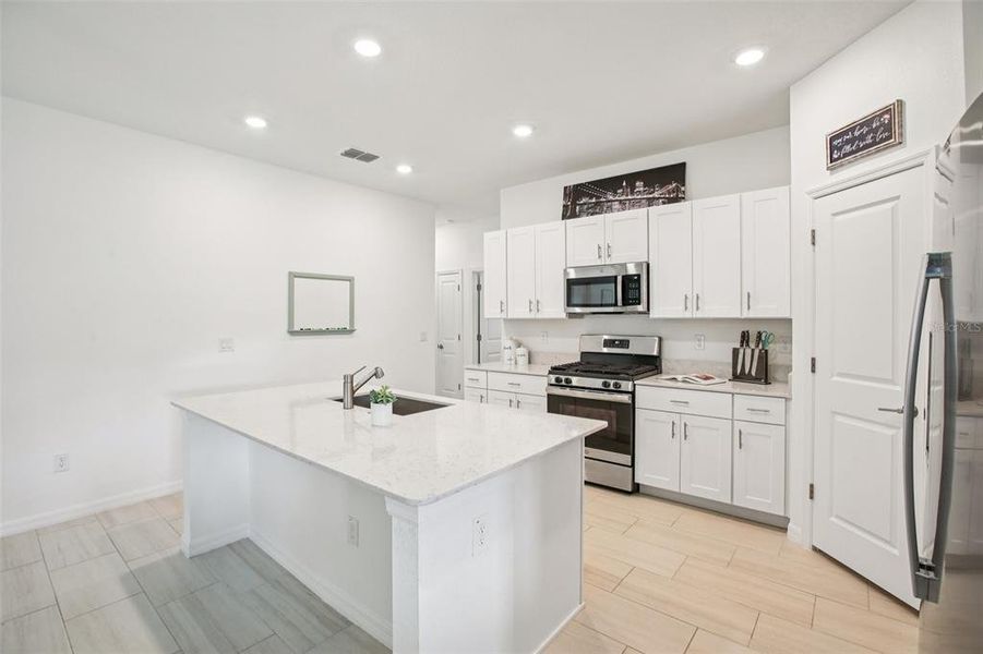 Furnished interior view inside a new home in , Land O' Lakes (Image 25).