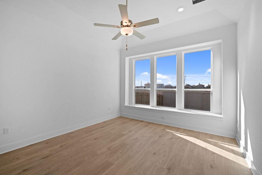Primary Bedroom with elevated ceiling