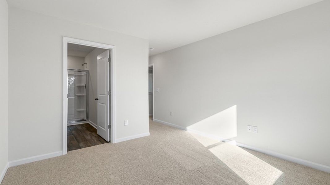 Spacious, unfurnished interior of a new home in The Townes at Honeycutt Oaks, Angier (Image 12).