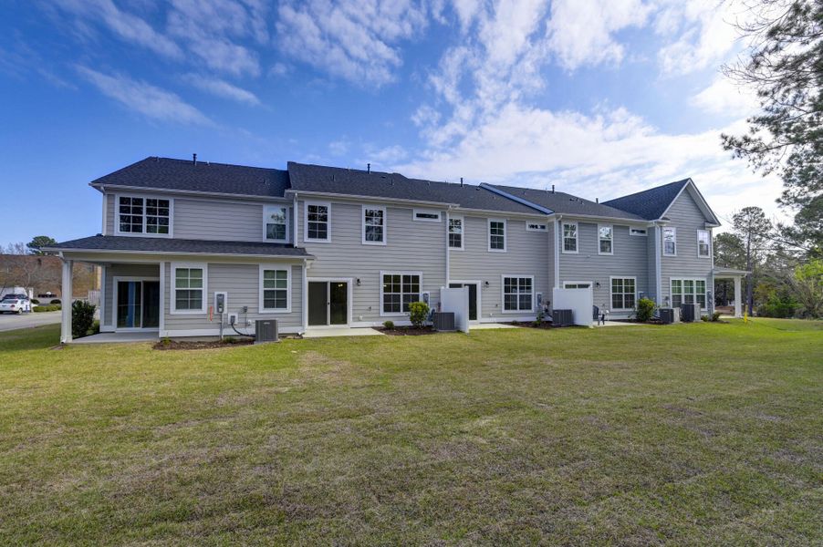 Exterior details and patio area of a home in Lake Carolina Townhomes, Columbia (Image 29).