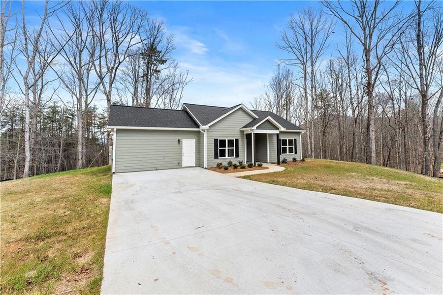 Front exterior of a new home in , Cleveland, GA, highlighting curb appeal (Image 23).