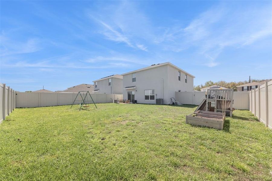 Exterior details and patio area of a home in Harvest Ridge, Zephyrhills (Image 25).