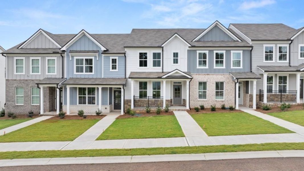 Front exterior of a new home in Waypoint, Flowery Branch, GA, highlighting curb appeal (Image 2).