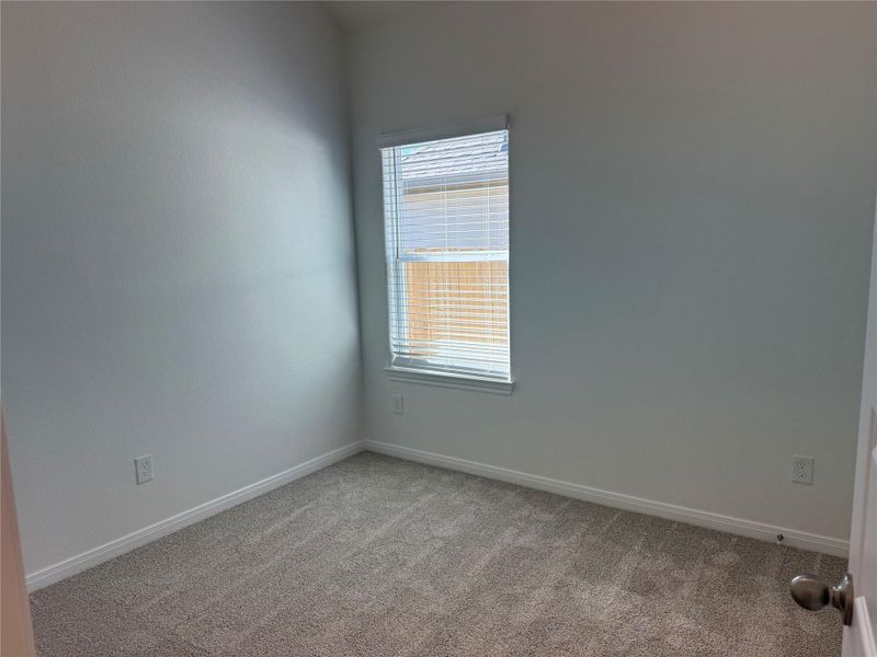 Spacious, unfurnished interior of a new home in East Gate Villas, Willis (Image 14).