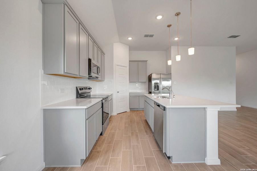 Furnished interior view inside a new home in Chaparral Ranch, Floresville (Image 9).