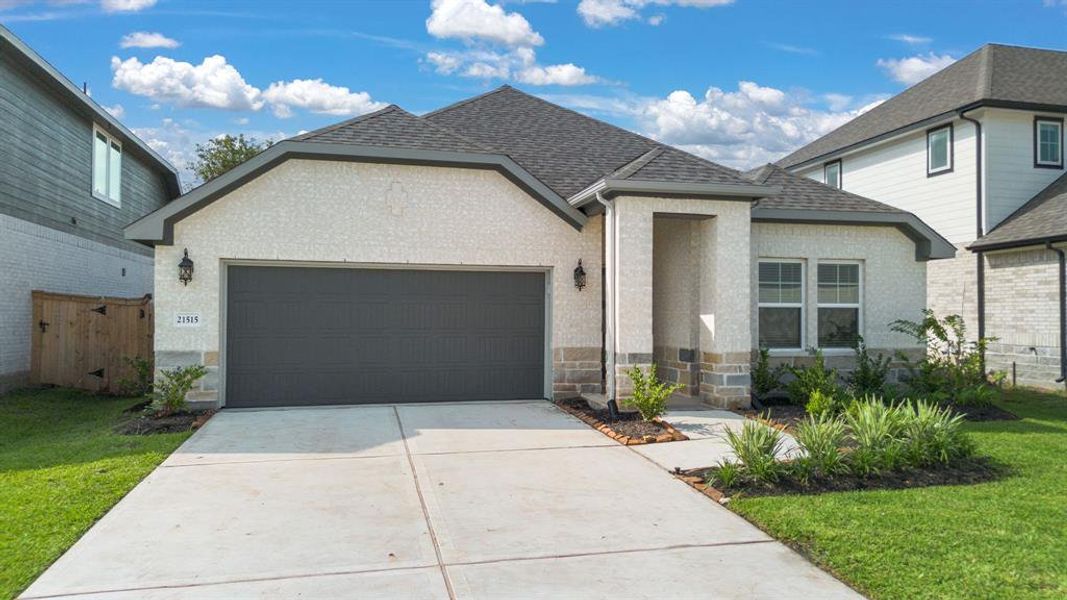 Upon arrival to this STUNNING home, elegance greets you prior to entry with a welcoming walkway to the private front entryway, beautiful brick & stone elevation and abundance of greenspace.