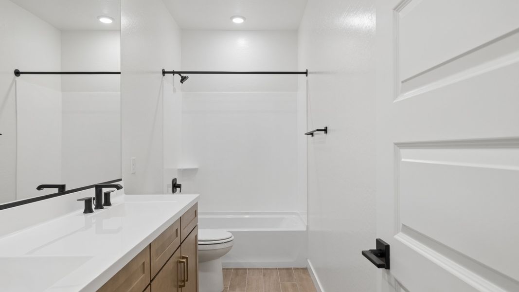Representative furnished interior of a home built from the Phoenician by D.R. Horton in The Ridge at Stone Butte, Phoenix (Image 13).
