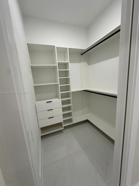 Cabinetry with integrated drawers and shelving