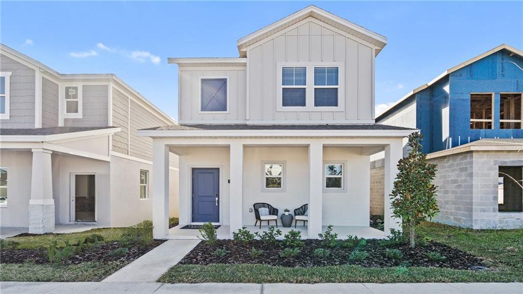 Front exterior of a new home in , Apopka, FL, highlighting curb appeal (Image 21). Front exterior of a new home in , Apopka, FL, highlighting curb appeal (Image 21).