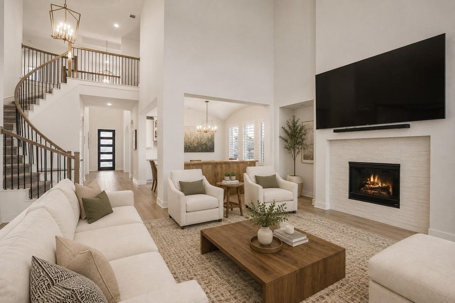 A curved staircase and open entry way add elegance and sophistication. A curved staircase and open entry way add elegance and sophistication.