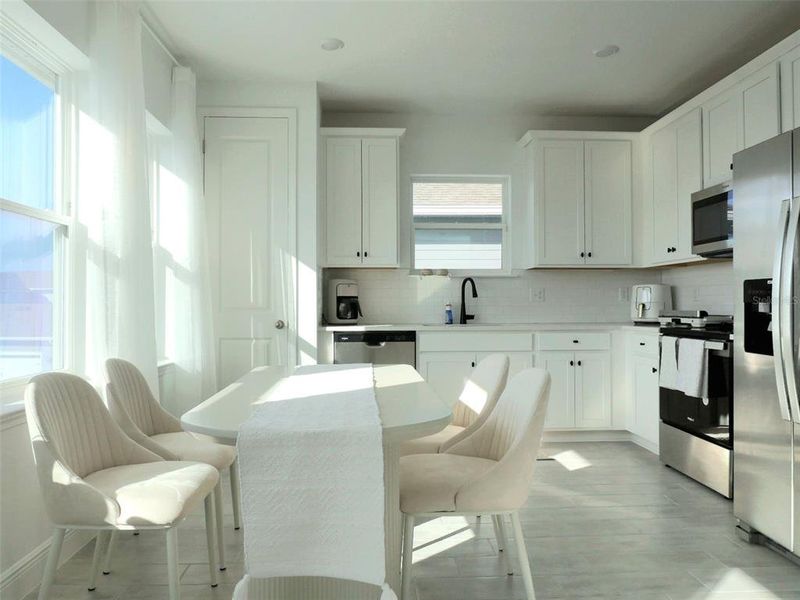 Furnished interior view inside a new home in Laureate Park, Orlando (Image 17).