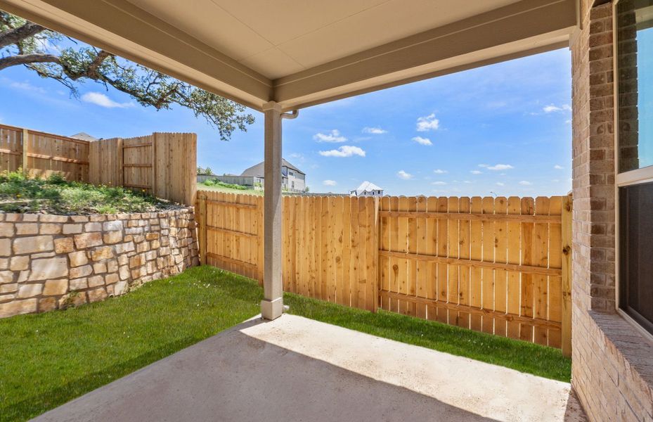 Exterior details and patio area of a home in Crescent Bluff, Georgetown (Image 3).