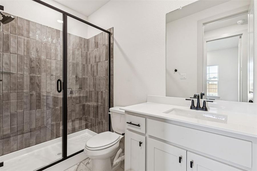 Friends and family will feel right at home in any of the beautifully finished guest baths.