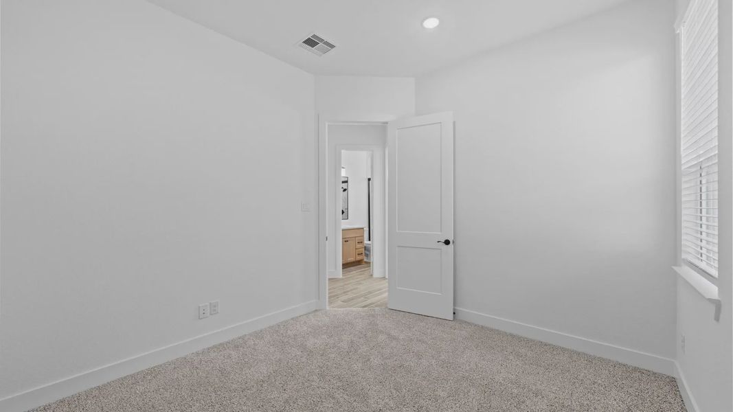 Representative unfurnished interior of a home built from the Rivers by Chesmar Homes in Sofi Lakes, Katy (Image 30).