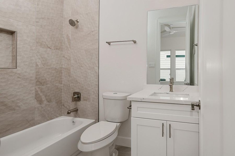 Furnished interior view inside a new home in Lake Breeze, Willis (Image 14).