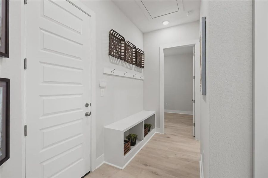 Representative furnished interior of a home built from the Draco by Chesmar Homes in The Grove at Blackhawk, Pflugerville (Image 12).