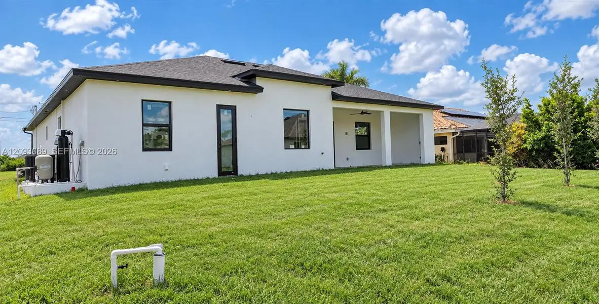 Exterior details and patio area of a home in , Cape Coral (Image 4).