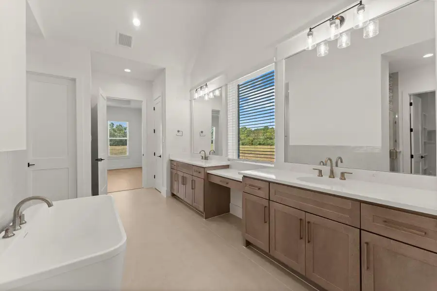 Furnished interior view inside a new home in Homestead Hill, New Waverly (Image 8).