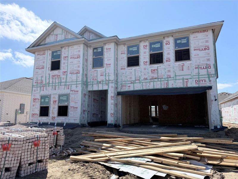 In-progress construction of a new home in Windrose Green, Angleton, TX (Image 26).