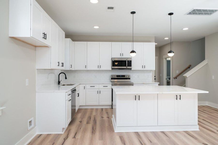 Furnished interior view inside a new home in , Summerville (Image 10).