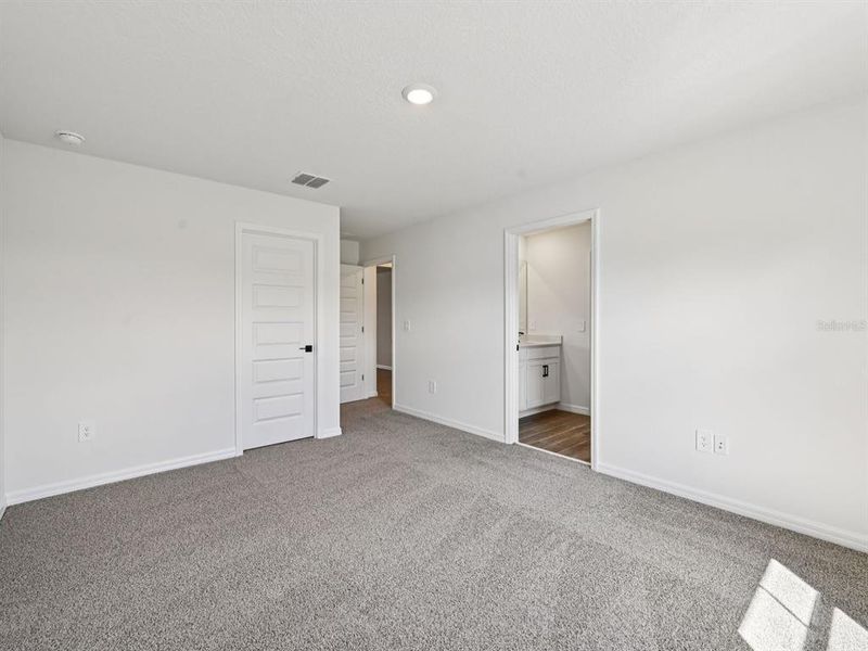 Spacious, unfurnished interior of a new home in Oakfield Trails - Signature Series, Parrish (Image 19).