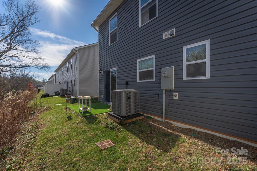 Exterior details and patio area of a home in , Arden (Image 25).