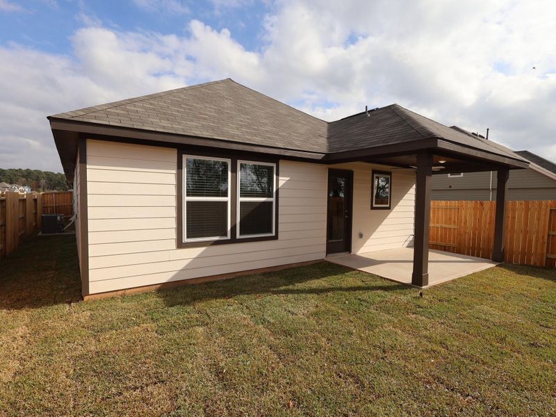 Exterior details and patio area of a home in Lone Star Landing, Montgomery (Image 4).