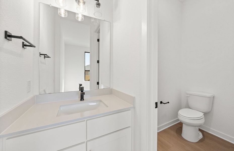 Furnished interior view inside a new home in 6 Creeks, Kyle (Image 7).