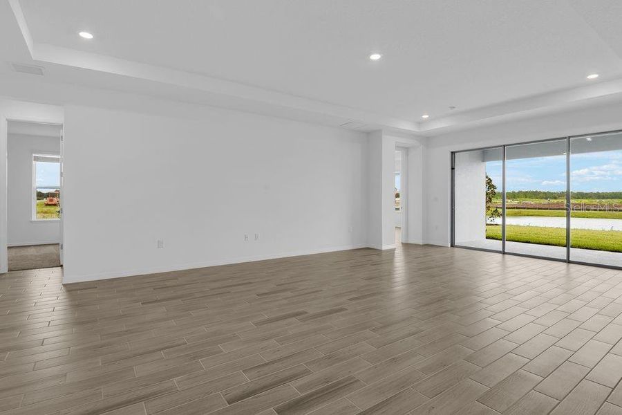 Spacious, unfurnished interior of a new home in Ardisia Park, New Smyrna Beach (Image 41).