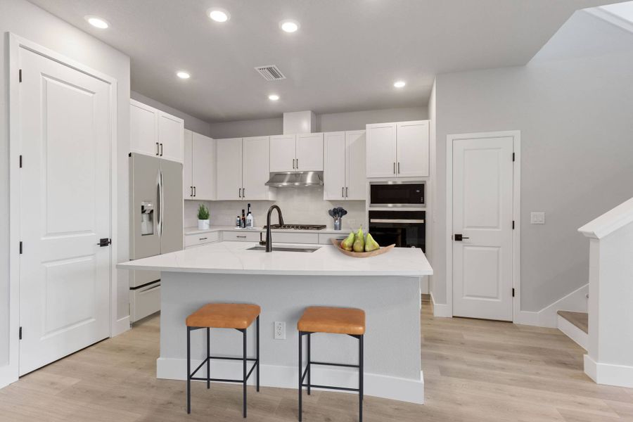 Representative furnished interior of a home built from the The Waterway by David Weekley Homes in Persimmon Place - Townhomes, Wesley Chapel (Image 5).