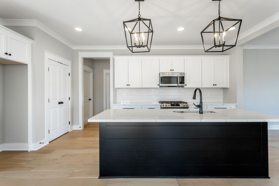 Representative furnished interior of a home built from the Carolina A by Riverstone Construction, LLC in Creekside, Cleveland (Image 7).