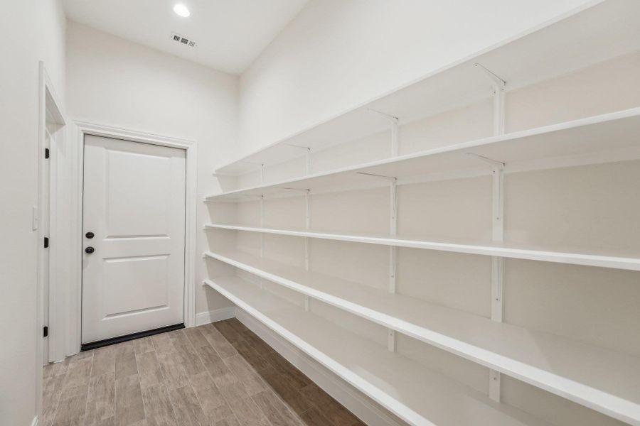 Pantry featuring built in shelving Pantry featuring built in shelving