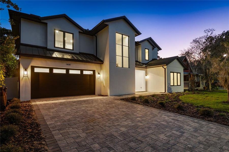 Front exterior of a new home in , Orlando, FL, highlighting curb appeal (Image 24). Front exterior of a new home in , Orlando, FL, highlighting curb appeal (Image 24).