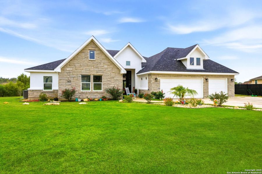 Front exterior of a new home in , Kyle, TX, highlighting curb appeal (Image 2). Front exterior of a new home in , Kyle, TX, highlighting curb appeal (Image 2).