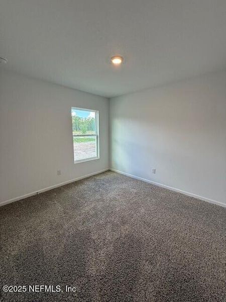 Spacious, unfurnished interior of a new home in Grand Reserve, Bunnell (Image 34).