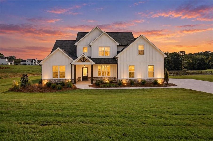Front exterior of a new home in , Cumming, GA, highlighting curb appeal (Image 31).