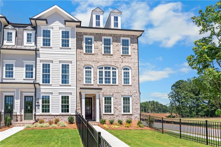 Front exterior of a new home in Waterside Townhomes, Peachtree Corners, GA, highlighting curb appeal (Image 21).