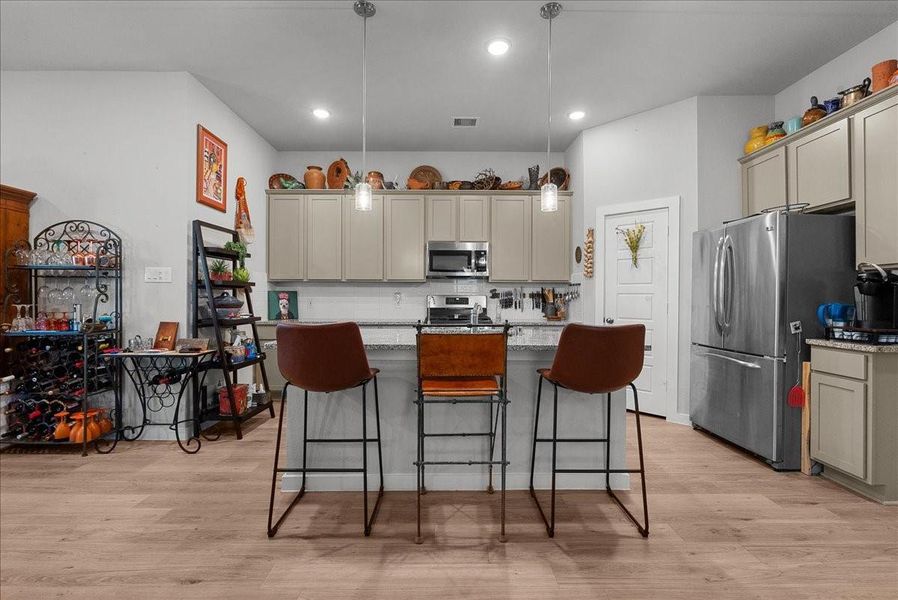 Furnished interior view inside a new home in Mustang Crossing, Alvin (Image 6).