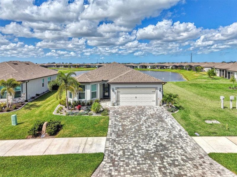 Front exterior of a new home in , Parrish, FL, highlighting curb appeal (Image 1). Front exterior of a new home in , Parrish, FL, highlighting curb appeal (Image 1).