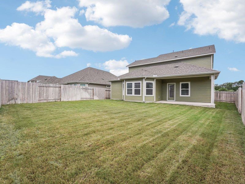 Exterior details and patio area of a home in Riverbend at Double Eagle - Boulevard Collection, Cedar Creek (Image 4). Exterior details and patio area of a home in Riverbend at Double Eagle - Boulevard Collection, Cedar Creek (Image 4).