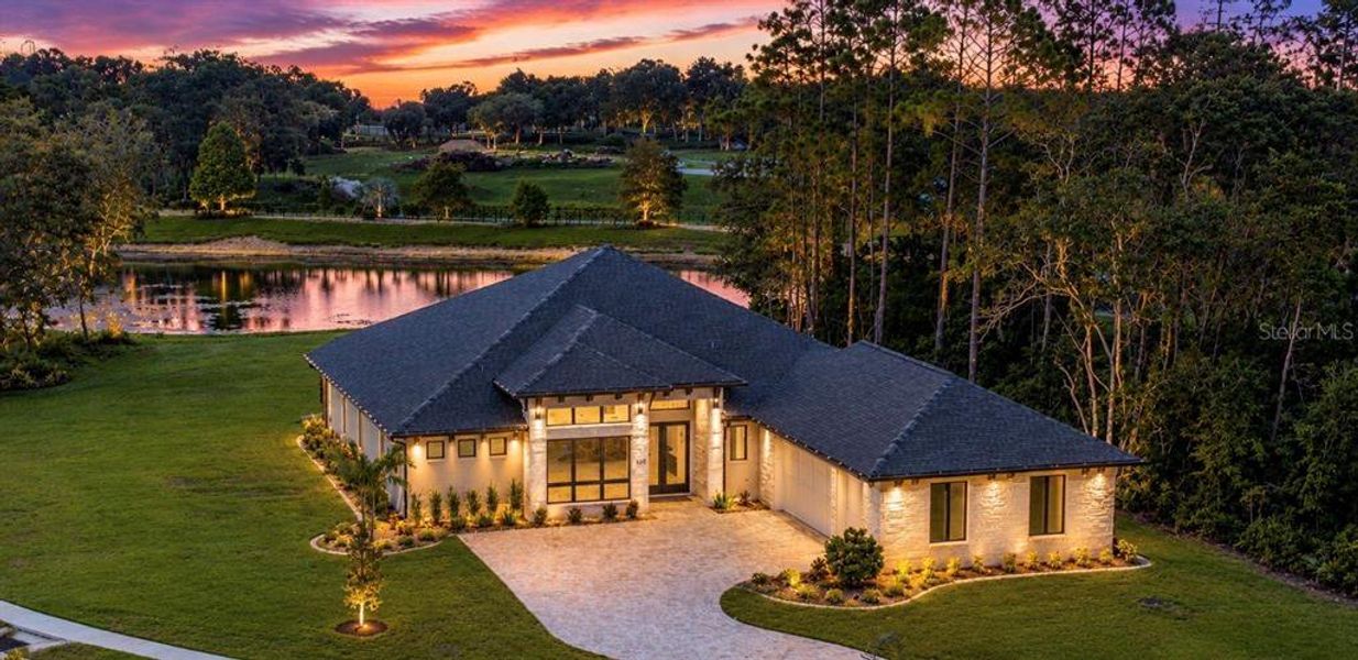Front exterior of a new home in , New Smyrna Beach, FL, highlighting curb appeal (Image 1). Front exterior of a new home in , New Smyrna Beach, FL, highlighting curb appeal (Image 1).