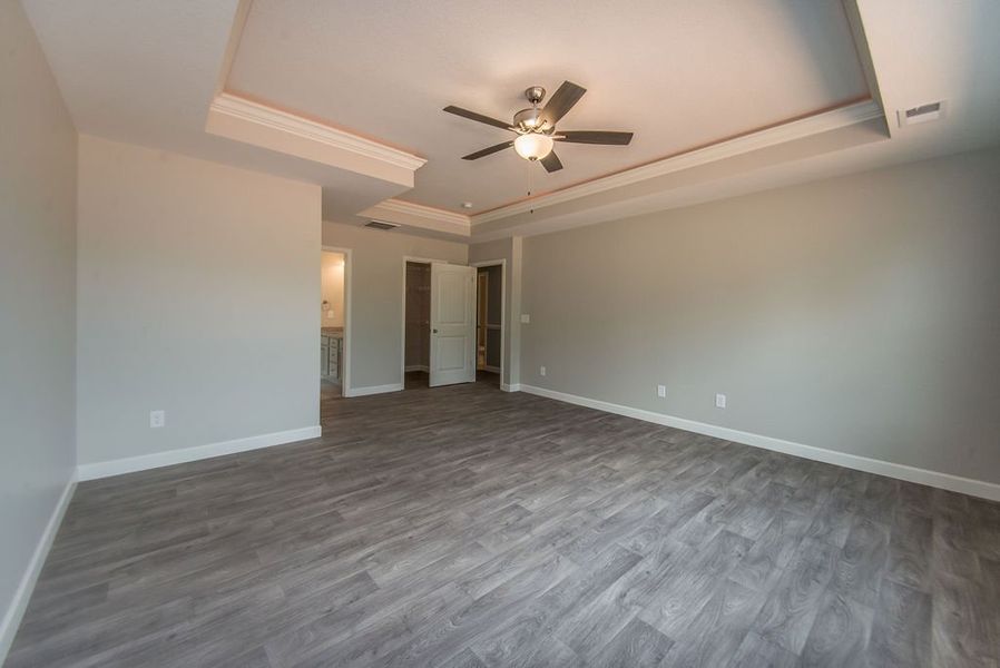 Representative unfurnished interior of a home built from the Beaumont by Enchanted Homes in Guadalupe Heights, Seguin (Image 54).