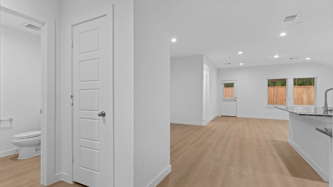 Spacious, unfurnished interior of a new home in Caldwell Crossing, Iowa Colony (Image 13).