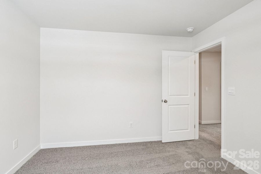 Spacious, unfurnished interior of a new home in Zion Springs, Hickory (Image 26).