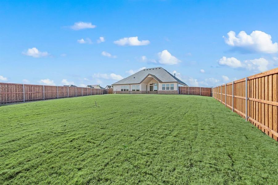 Exterior details and patio area of a home in Settlers Glen, New Fairview (Image 25).
