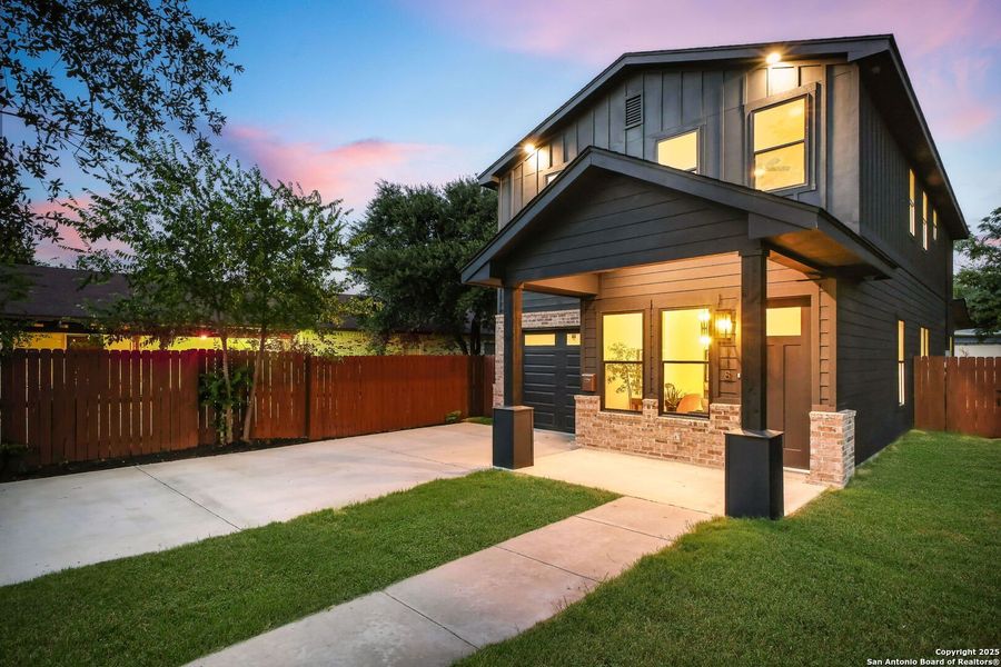 Front exterior of a new home in , San Antonio, TX, highlighting curb appeal (Image 2).
