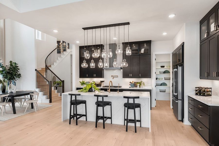 Representative furnished interior of a home built from the Linden by Tri Pointe Homes in Lagos Reserve, Manor (Image 25).