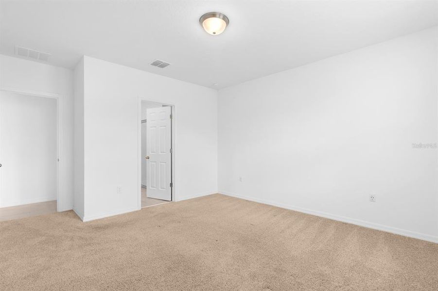 Spacious, unfurnished interior of a new home in Lawson Dunes - Signature Series, Haines City (Image 17).