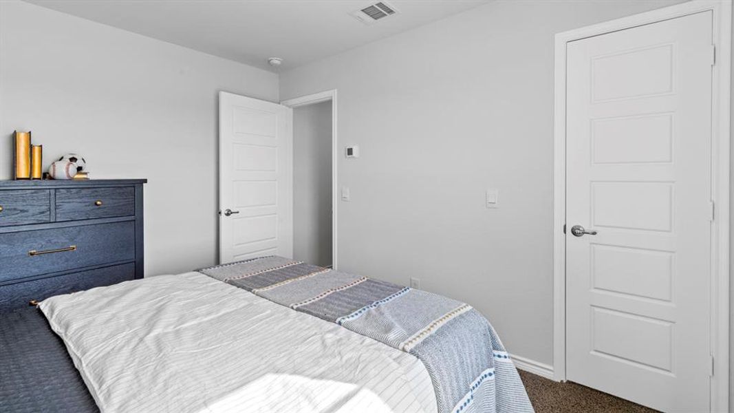 Light gray wall paint complemented by white trim and a ceiling-mounted light fixture Light gray wall paint complemented by white trim and a ceiling-mounted light fixture